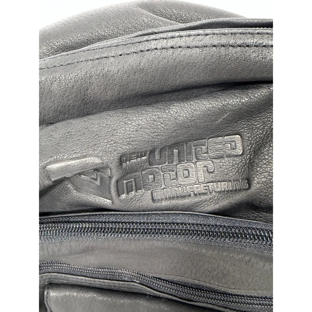 New United Motor Manufacturing Black Leather Backpack Multi Pocket YKK Zipper